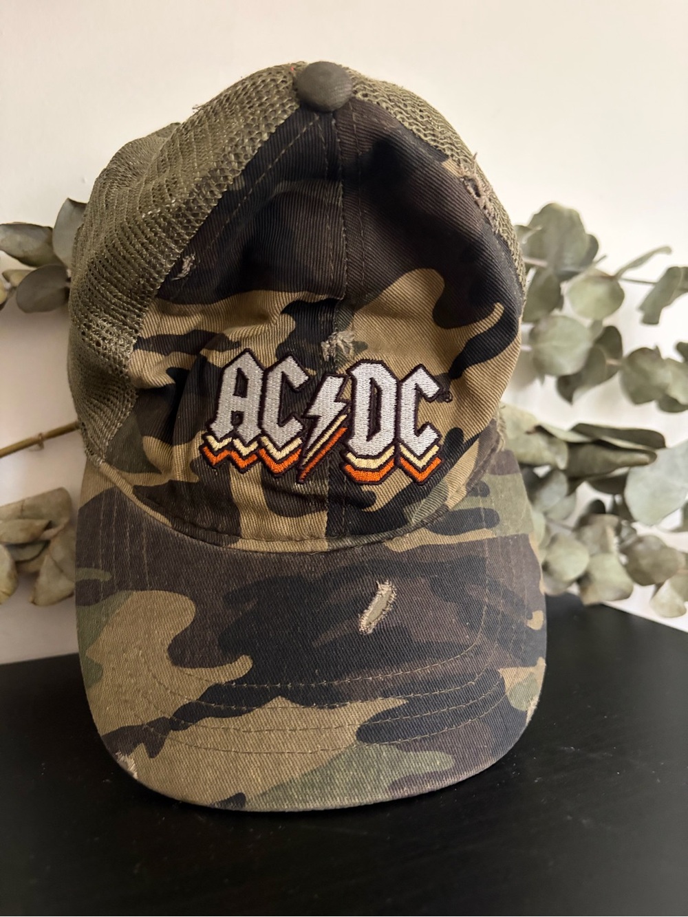 Vintage AC/DC Camouflage Trucker Hat with Orange Lightning Logo